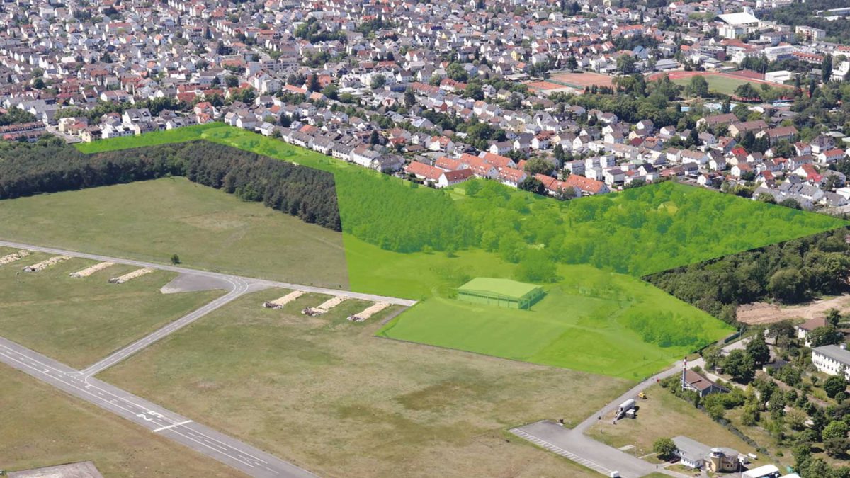 Luftbild von der Konversionsfläche Süd-Ost. Die Fläche für das neue Quartier ist grün markiert.